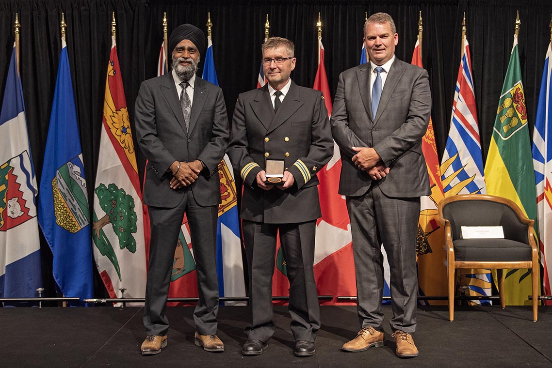 The  Honourable Harjit S. Sajjan, President  of the King’s Privy Council for Canada and Minister of Emergency Preparedness  (far left) and Minister responsible for the Pacific Economic Development Agency  of Canada, and the Honourable Bloyce Thompson, Deputy Premier, Minister of  Justice and Public Safety and Attorney General for Prince Edward Island (far  right) are pictured with the 2022 award recipient of the Emergency Management  Exemplary Service Award for the Search and Rescue category.