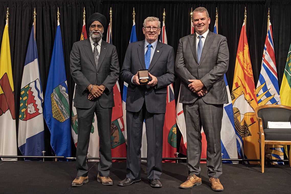 The  Honourable Harjit S. Sajjan, President  of the King’s Privy Council for Canada and Minister of Emergency Preparedness  (far left) and Minister responsible for the Pacific Economic Development Agency  of Canada, and the Honourable Bloyce Thompson, Deputy Premier, Minister of  Justice and Public Safety and Attorney General for Prince Edward Island (far  right) are pictured with the 2022 award recipient of the Emergency Management  Exemplary Service Award for the Search and Rescue category.