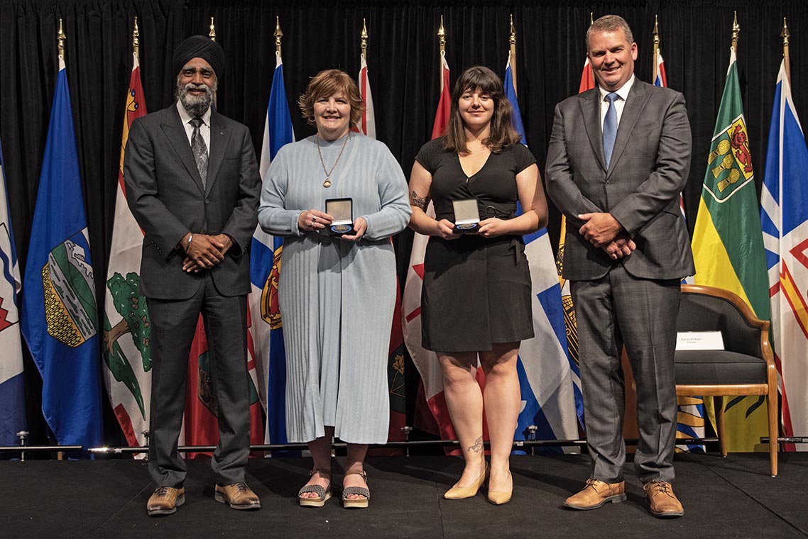 The Honourable Harjit S. Sajjan, President of the King’s Privy Council for Canada and Minister of  Emergency Preparedness (far left) and Minister responsible for the Pacific  Economic Development Agency of Canada, and the Honourable Bloyce Thompson, Deputy  Premier, Minister of Justice and Public Safety and Attorney General for Prince  Edward Island (far right) are pictured with the 2022 award recipients of the  Emergency Management Exemplary Service Award for the Outstanding Contribution  to Emergency Management category.