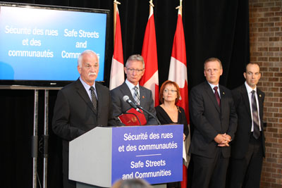 The Honourable Vic Toews, Minister of Public Safety and the Honourable Senator Pierre-Hugues Boisvenu, accompanied by speakers Line Lacasse (mother of Sébastien Lacasse), Pierre Veilleux (President, Association des policières et policiers provinciaux du Québec (APPQ)) and René Morin (Spokesperson, Canadian Centre for Child Protection), announced the Safe Streets and Communities Act, in Montreal on September 20th 2011. The comprehensive legislation targets crime and terrorism and provides support and protection to victims of crime.